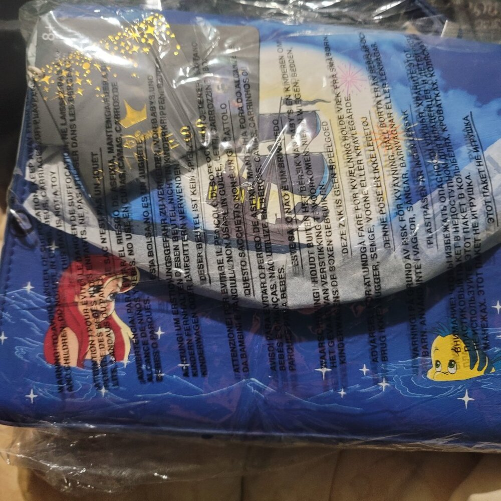 Disney Lounge fly little mermaid purse only been taken out of plastic to take ph